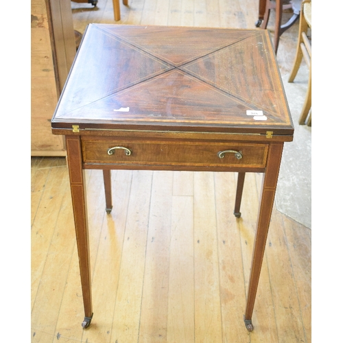 988 - An Edwardian inlaid mahogany envelope card table, 56 cm wide