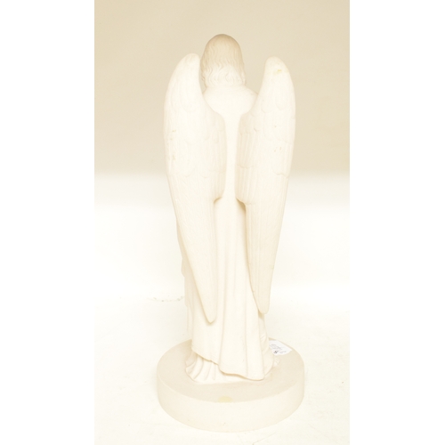 554 - A Mintons Parianware figure, of an angel, impressed mark to base, 32 cm high