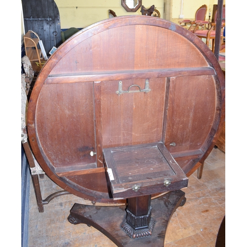 982 - A Regency rosewood tilt top breakfast table, on a triform platform base, 137 cm diameter