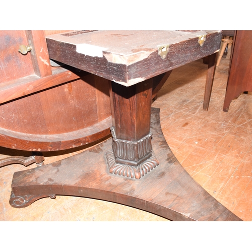 982 - A Regency rosewood tilt top breakfast table, on a triform platform base, 137 cm diameter