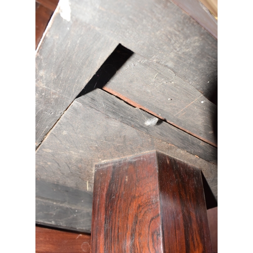 982 - A Regency rosewood tilt top breakfast table, on a triform platform base, 137 cm diameter