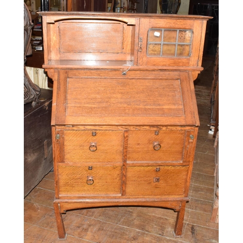 1163 - An Arts & Crafts oak bureau cabinet, 92 cm wide