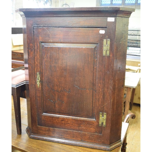 1136 - An oak chest four drawers, 89.5 cm wide and two chairs, a corner cupboard, and two stools (6)