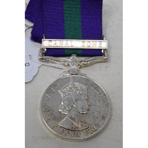 211 - A General Service Medal 1918-62, with Canal Zone bar, unnamed, and a box