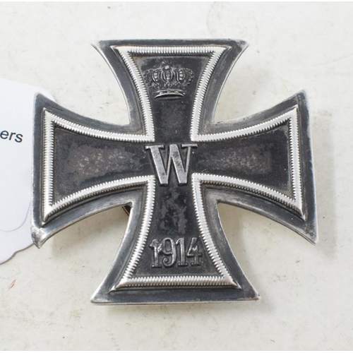 213 - A German iron cross, slightly convex, marked 925, with screw but lacking plate, worn