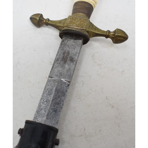 226 - A Dirk, with an engraved blade and scabbard