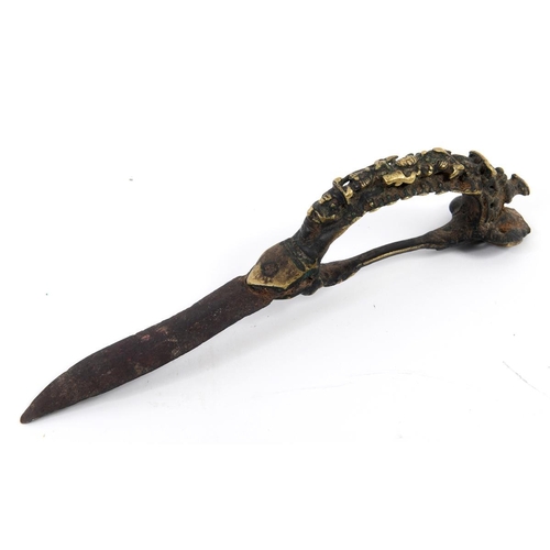 231 - An Indian Bichawa, the handle with figural decoration, and a steel blade, 23 cm See illustration