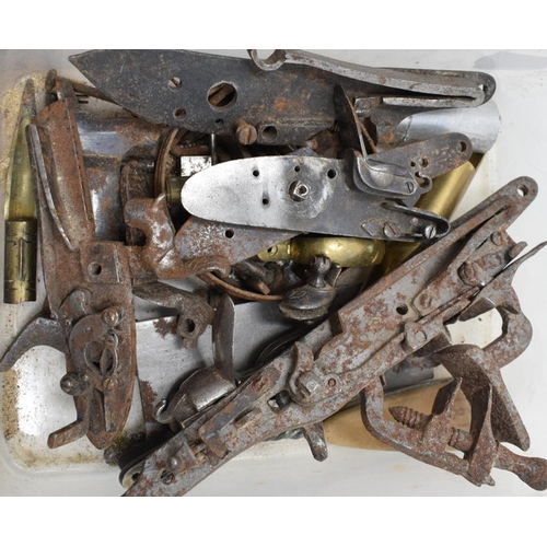 234 - Assorted flintlock movements and parts, including East India Company