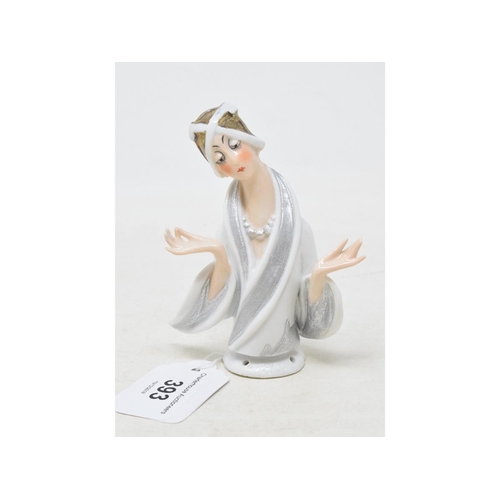 393 - An Art Deco porcelain half doll, lady wearing a gold hat and a white and silver robe, hands held out... 