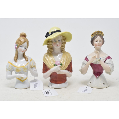 540 - A Goebel porcelain half doll, Princess Wilhelmina of Prussia, hands out, 14 cm high, and two others ... 