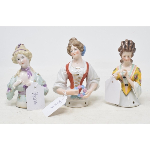 544 - A Goebel porcelain half doll, Elizabeth of Austria, lady with ring, 12 cm high, and two others (3)