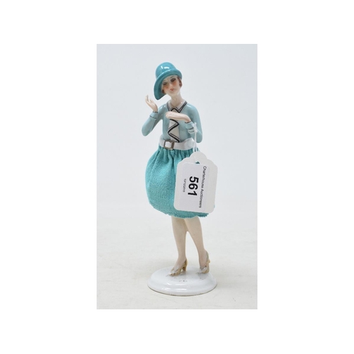 561 - A porcelain half doll original assembly, lady wearing a turquoise dress and matching hat, 20 cm high