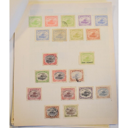 58 - A group of Papua New Guinea stamps, an old collection on leaves with better sets and values