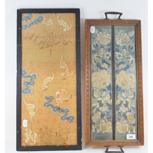 644 - A Chinese embroidered panel, decorated bats and with painted calligraphy, 61 cm wide