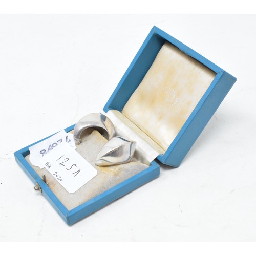 125A - EXTRA LOT: A pair of Georg Jensen silver earrings, designed by Vivianna Torun Bulow-Hube, boxed