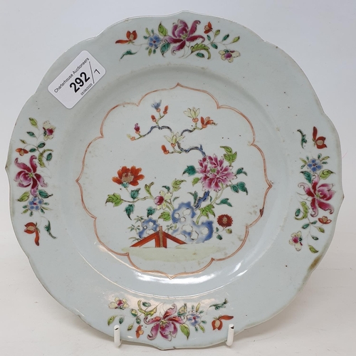 292 - A set of four Chinese porcelain famille rose plates, of shaped circular form, decorated flowers and ... 