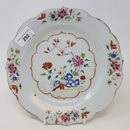 292 - A set of four Chinese porcelain famille rose plates, of shaped circular form, decorated flowers and ... 