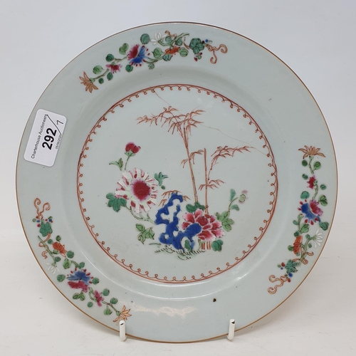 292 - A set of four Chinese porcelain famille rose plates, of shaped circular form, decorated flowers and ... 