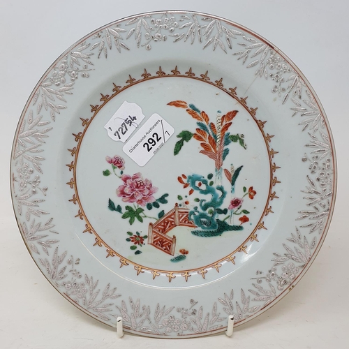 292 - A set of four Chinese porcelain famille rose plates, of shaped circular form, decorated flowers and ... 