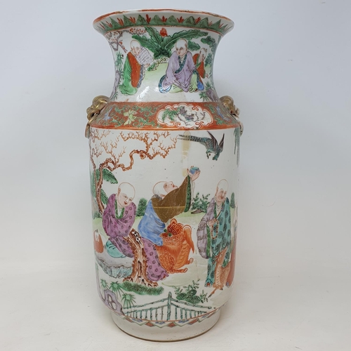 301 - A Chinese famille rose vase, of slightly tapering form, decorated sage, other figures, a deer, a Dog... 
