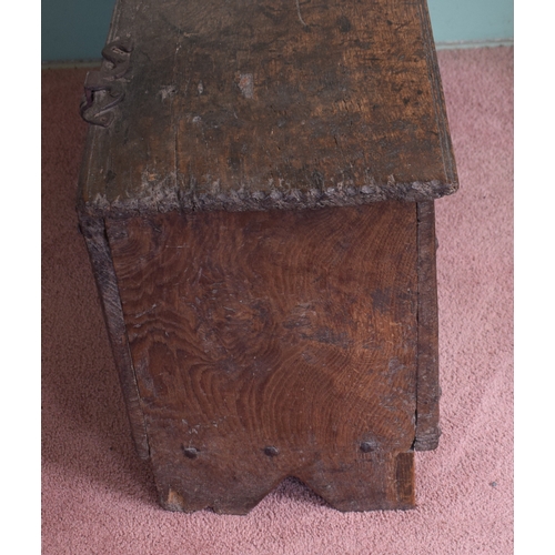 11 - A 17th century carved oak six plank coffer, with later blacksmith made shaped iron hinges, 93 cm wid... 