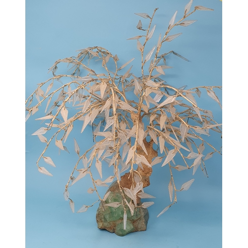 25 - A Chinese 'tree', on a green quartz base, on a hardwood stand, approx. 54 cm high, removal cost A