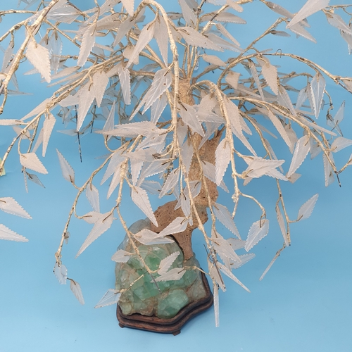 25 - A Chinese 'tree', on a green quartz base, on a hardwood stand, approx. 54 cm high, removal cost A