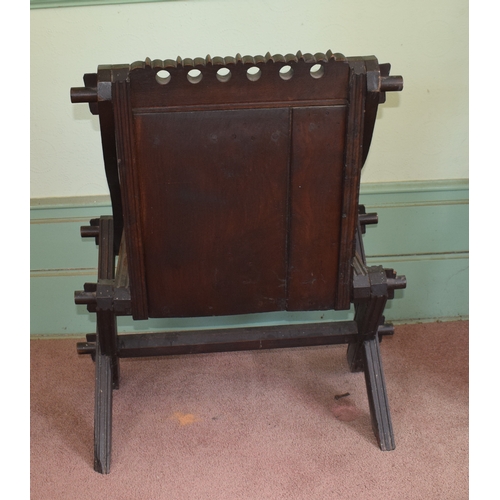 30 - A Glastonbury carved oak armchair, removal cost B