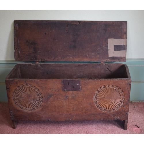 11 - A 17th century carved oak six plank coffer, with later blacksmith made shaped iron hinges, 93 cm wid... 