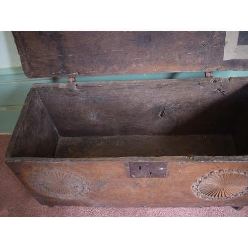 11 - A 17th century carved oak six plank coffer, with later blacksmith made shaped iron hinges, 93 cm wid... 