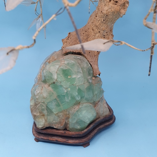 25 - A Chinese 'tree', on a green quartz base, on a hardwood stand, approx. 54 cm high, removal cost A