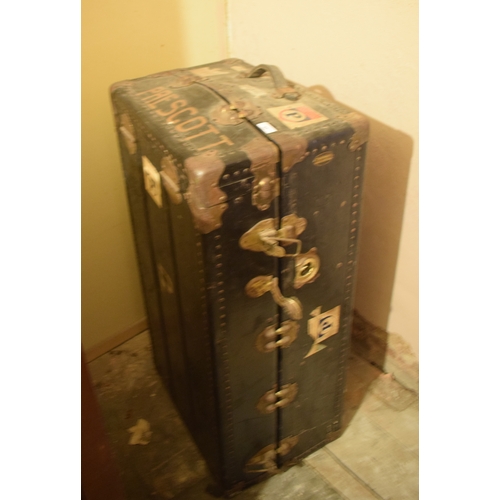 42 - An early 20th century travelling trunk, with drawers and a hanging section, 106 cm wide, removal cos... 