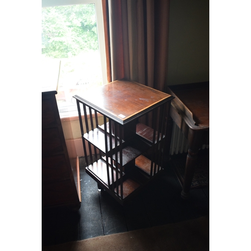 119 - An Edwardian inlaid mahogany revolving bookcase, 48 cm square, removal cost B