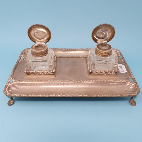 186 - An Edward VII silver inkstand, with a pair of cut glass ink wells with silver tops, London 1905, 18.... 