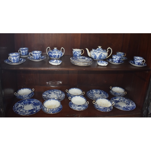 164 - A Royal Crown Derby part blue and white service in the Chinese manner, comprising, a teapot, cream j... 