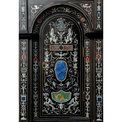 166 - A 19th century Italian ebonised breakfront cabinet, in the manner of Giovanni Battista Gatti, with o... 