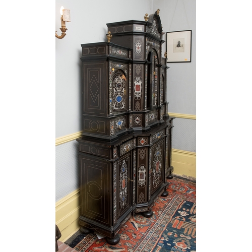 166 - A 19th century Italian ebonised breakfront cabinet, in the manner of Giovanni Battista Gatti, with o... 