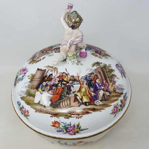 179 - A Berlin porcelain punch bowl and cover, with a putto finial, decorated extensive scenes of figures ... 