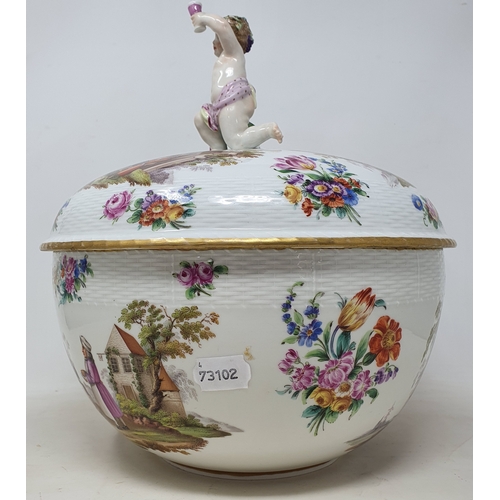 179 - A Berlin porcelain punch bowl and cover, with a putto finial, decorated extensive scenes of figures ... 