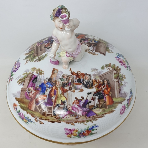 179 - A Berlin porcelain punch bowl and cover, with a putto finial, decorated extensive scenes of figures ... 