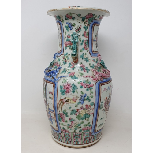 180 - A Chinese famille rose vase, of baluster form, decorated four rectangular cartouches with figures su... 