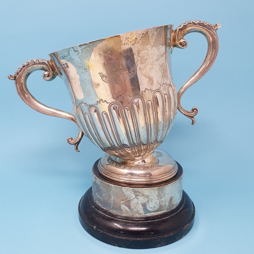 183 - A Victorian two handled silver trophy cup, engraved The Harefield cup, Lympstone horse show, on an e... 