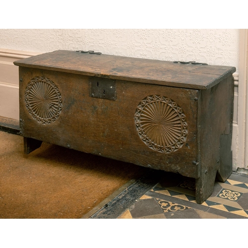 11 - A 17th century carved oak six plank coffer, with later blacksmith made shaped iron hinges, 93 cm wid... 