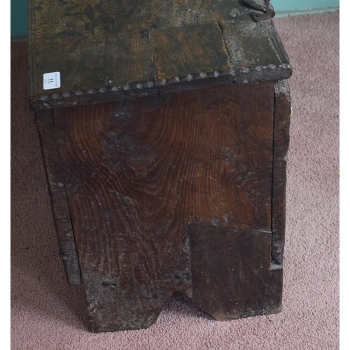 11 - A 17th century carved oak six plank coffer, with later blacksmith made shaped iron hinges, 93 cm wid... 