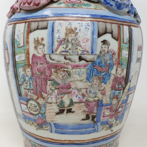 180 - A Chinese famille rose vase, of baluster form, decorated four rectangular cartouches with figures su... 