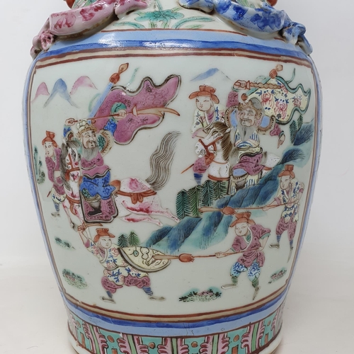 180 - A Chinese famille rose vase, of baluster form, decorated four rectangular cartouches with figures su... 