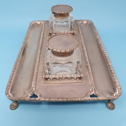 186 - An Edward VII silver inkstand, with a pair of cut glass ink wells with silver tops, London 1905, 18.... 