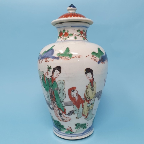 187 - A Chinese vase and cover, decorated figures, 22 cm high, removal cost A