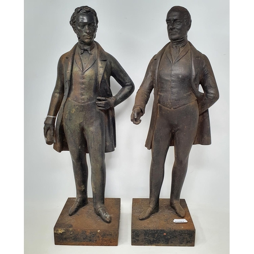 200 - A pair of iron figures, of political gentleman, 50.5 cm high (2), removal cost A