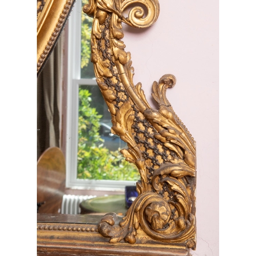 201 - A large pair of 19th century gilt gesso oval overmantel mirrors, each surmounted with a bird, a ribb... 